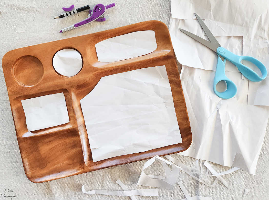making paper patterns that fit inside the tray compartments