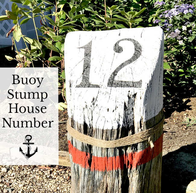 painting a tree stump like a nautical buoy