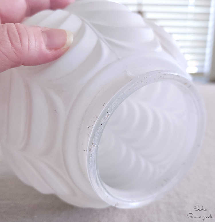 opening of a glass light globe