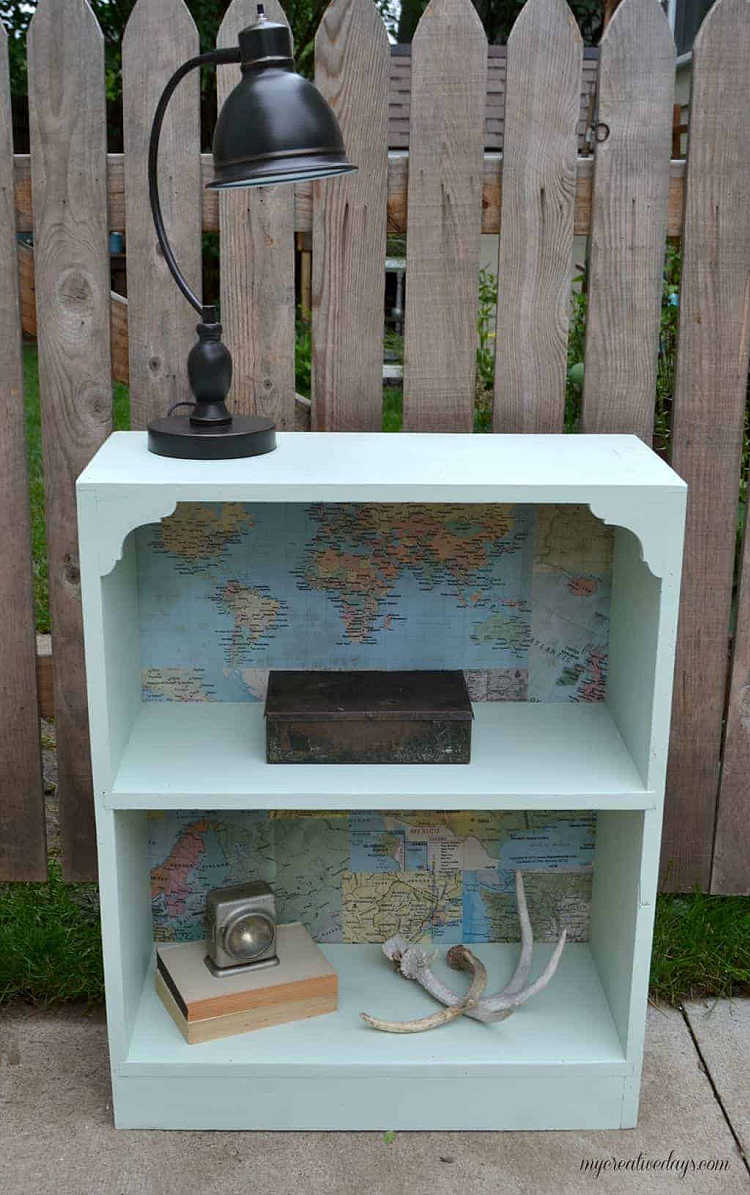 embellishing the interior of a bookcase with a vintage map