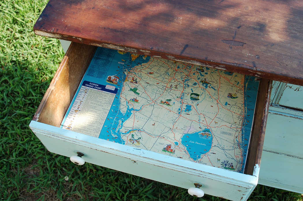 lining a drawer with a vintage map